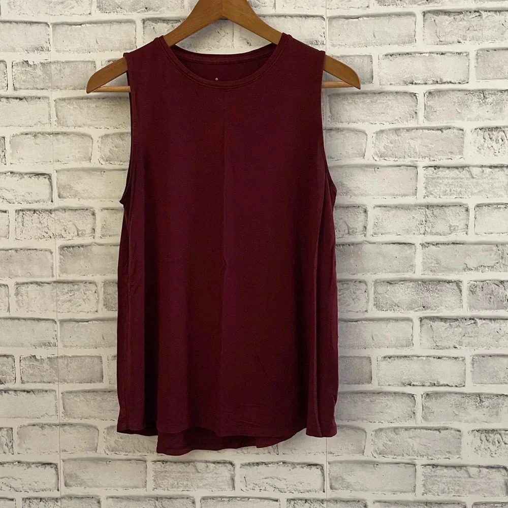 A new day loose fit flowing maroon colored sleeveless top Medium